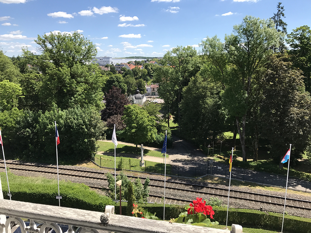 View from an upper window (facing east) of Hôtel-Club Cosmos Contrexéville. In 1918, there was a balcony and walkway which would have extended in this direction.